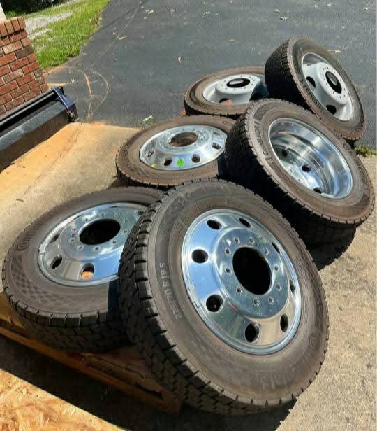 Six Continentals 225 70 19.5 mounted on aluminum stock rims  less than 1000 miles.
